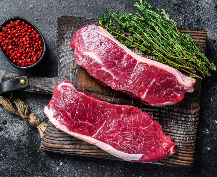 Raw,Marbled,Beef,Meat,Sirloin,Steak.,Black,Background.,Top,View