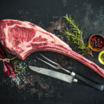 Dry,Aged,Raw,Tomahawk,Beef,Steak,With,Ingredients,For,Grilling