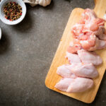 Fresh,Raw,Chicken,Wings,On,Wooden,Board,With,Ingredients