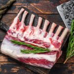 Rack,Of,Lamb,Raw,Meat,With,Bone,On,A,Cutting
