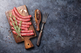 Raw,Sausages,And,Ingredients,For,Cooking.,Top,View,With,Copy