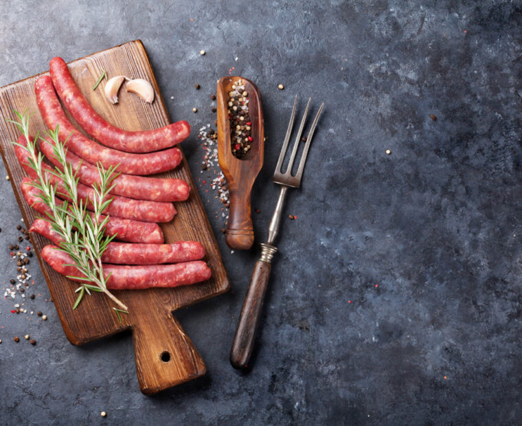 Raw,Sausages,And,Ingredients,For,Cooking.,Top,View,With,Copy