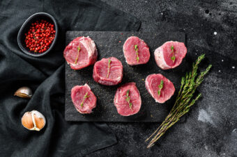 Raw,Pork,Medallion,Steaks.,Pork,Meat,Fillet.,Black,Background.,Top