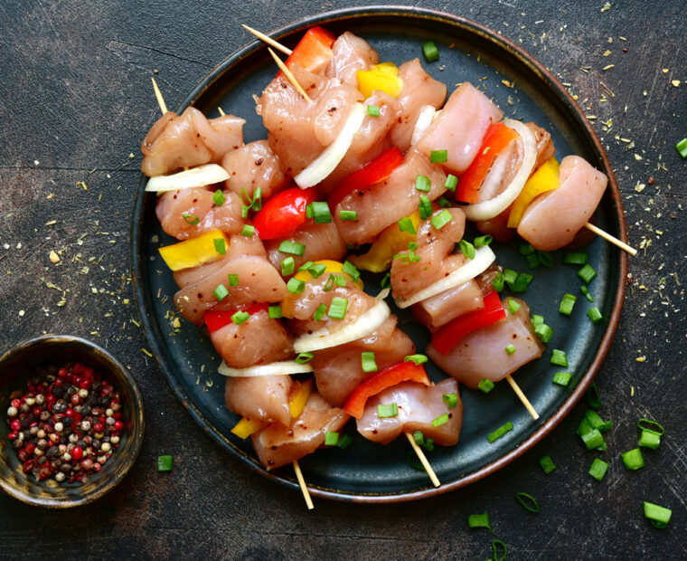 Raw,Chicken,Kebab,With,Ingredients,For,Marinating,On,A,Dark